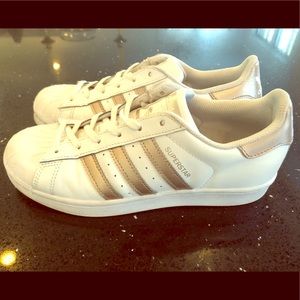 Women’s adidas white and rose gold sneakers
